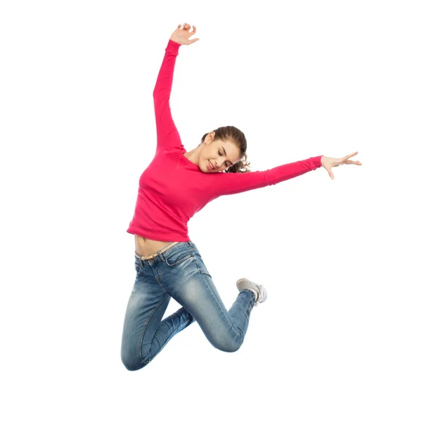 Feliz joven saltando en el aire o bailando — Foto de Stock