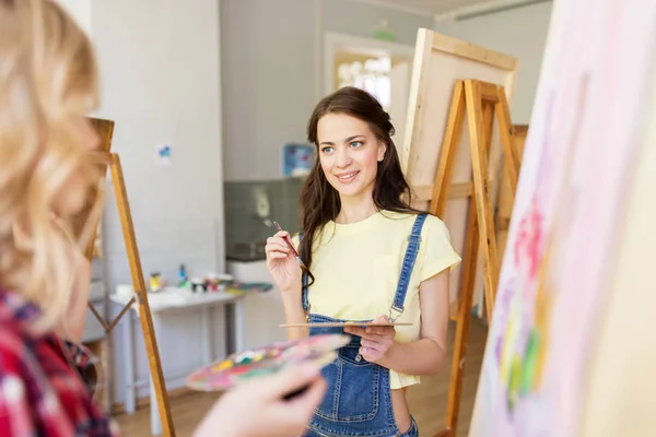 Artists or student girls painting at art school — Stock Photo, Image