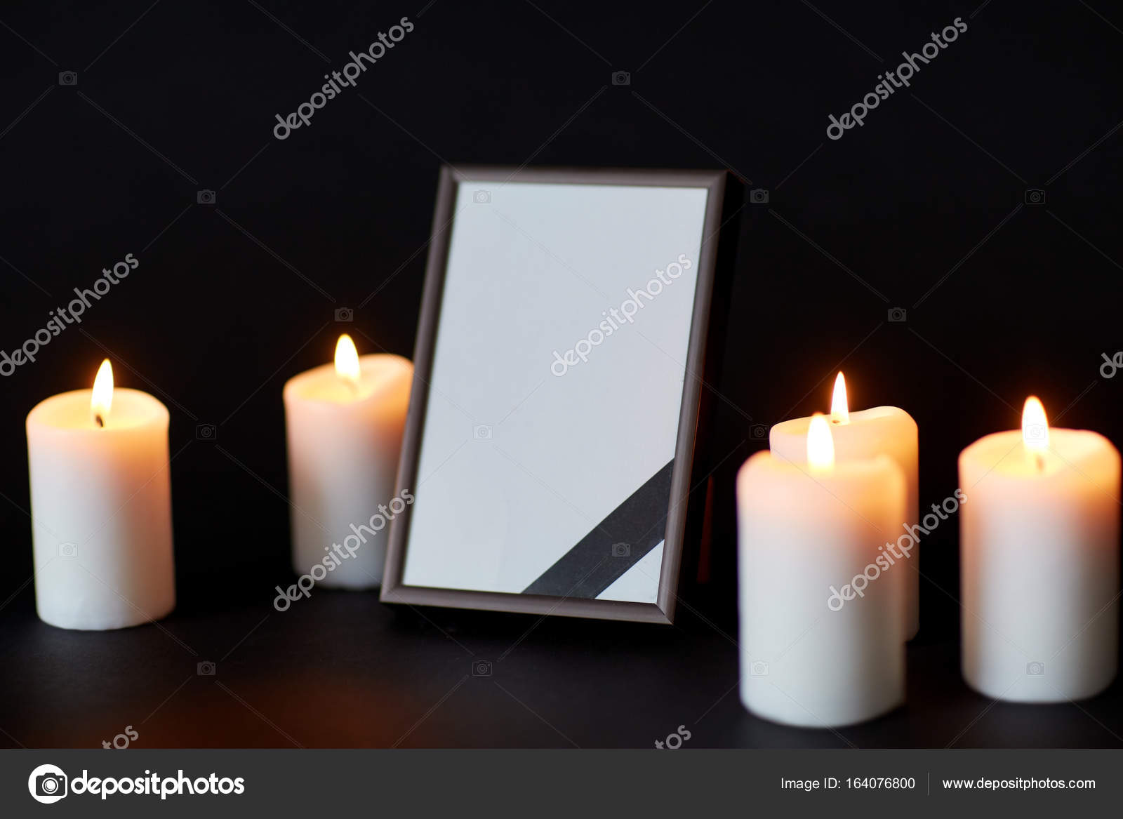 Black ribbon on photo frame and candles at funeral Stock Photo by  ©Syda_Productions 164076800