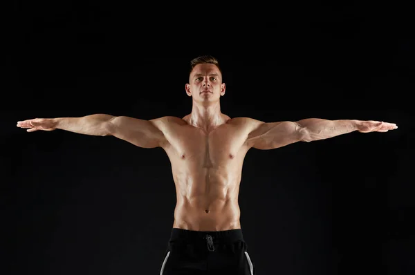 Young man or bodybuilder with bare torso — Stock Photo, Image