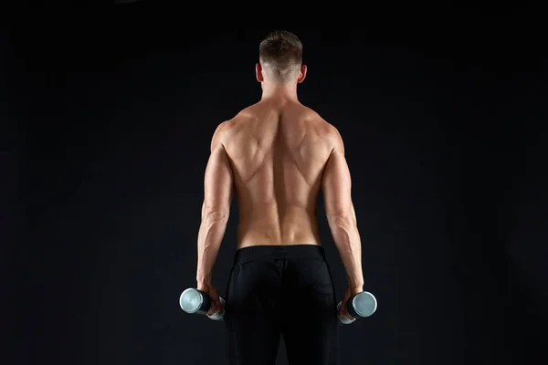 Man with dumbbells exercising — Stock Photo, Image