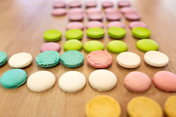 Macarons on table at confectionery or bakery — Stock Photo, Image