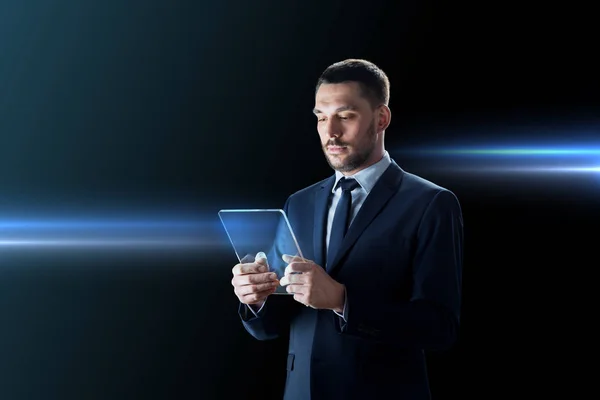 Businessman working with transparent tablet pc — Stock Photo, Image