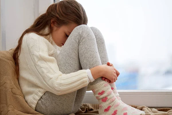 Beautiful sad girl at home — Stock Photo, Image