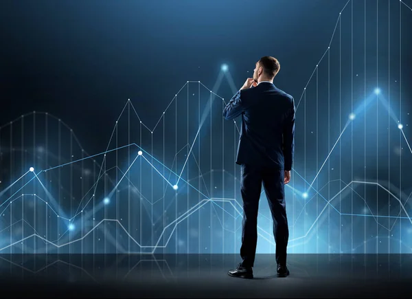 Businessman in suit from back with virtual graph — Stock Photo, Image