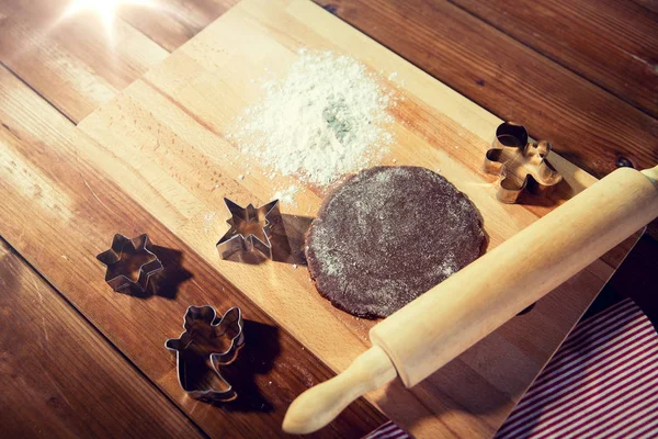 Close up of ginger dough, molds and rolling pin — Stock Photo, Image