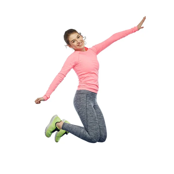 Feliz sonriente joven deportista saltando en el aire —  Fotos de Stock