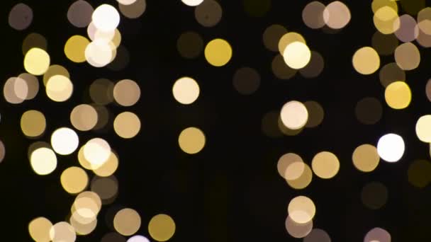暗い背景上のぼやけ・ クリスマス ライト — ストック動画