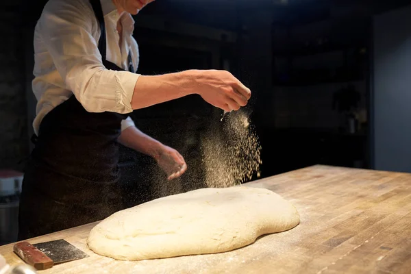 Chef or baker making bread dough at bakery — Stock Photo, Image