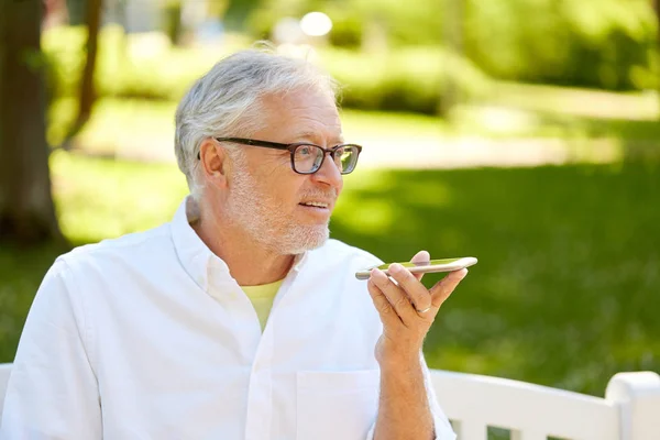 Old man using voice command recorder on smartphone — Stock Photo, Image