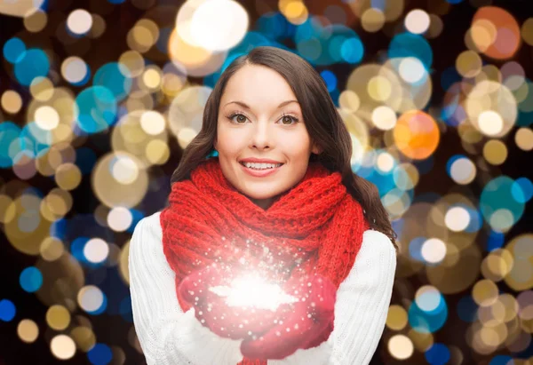 Woman in scarf with christmas magic snowflake — Stock Photo, Image