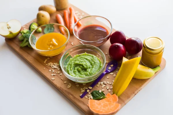 Vegetable puree or baby food in glass bowls — Stock Photo, Image