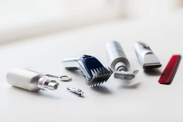 Styling hair sprays, clippers, comb and scissors — Stock Photo, Image