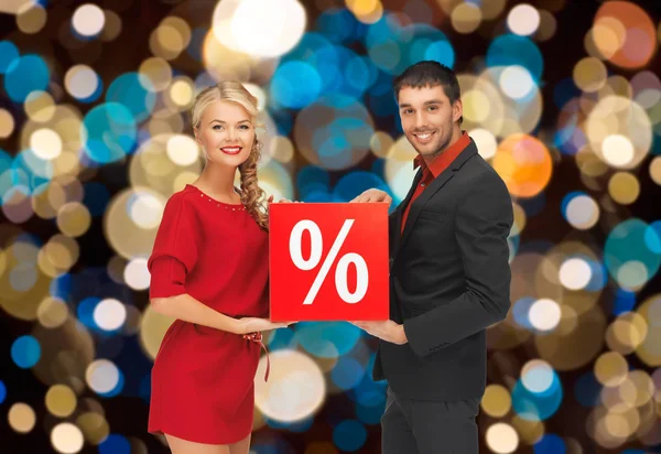Par med rabatt logga över julbelysning — Stockfoto