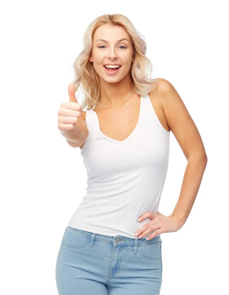 Glad ung kvinna visar tummen — Stockfoto
