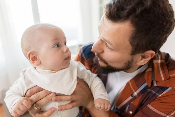 Close up of father with little baby boy at home — Stock Photo, Image