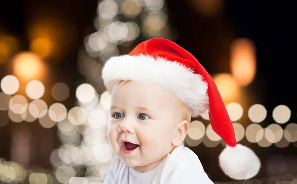 Malý chlapeček v santa hat na Vánoce — Stock fotografie