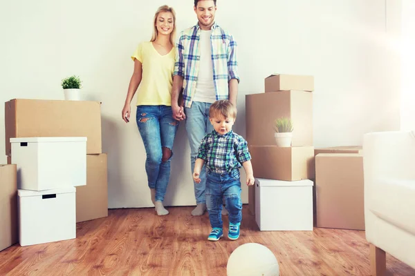 Happy family moving to new home and playing ball Royalty Free Stock Photos