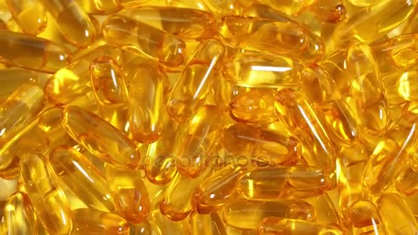 Cod liver oil capsules — Stock Video