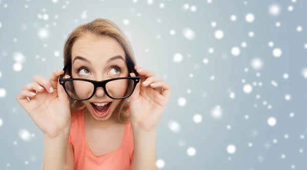 Happy woman or teenage girl in eyeglasses — Stock Photo, Image