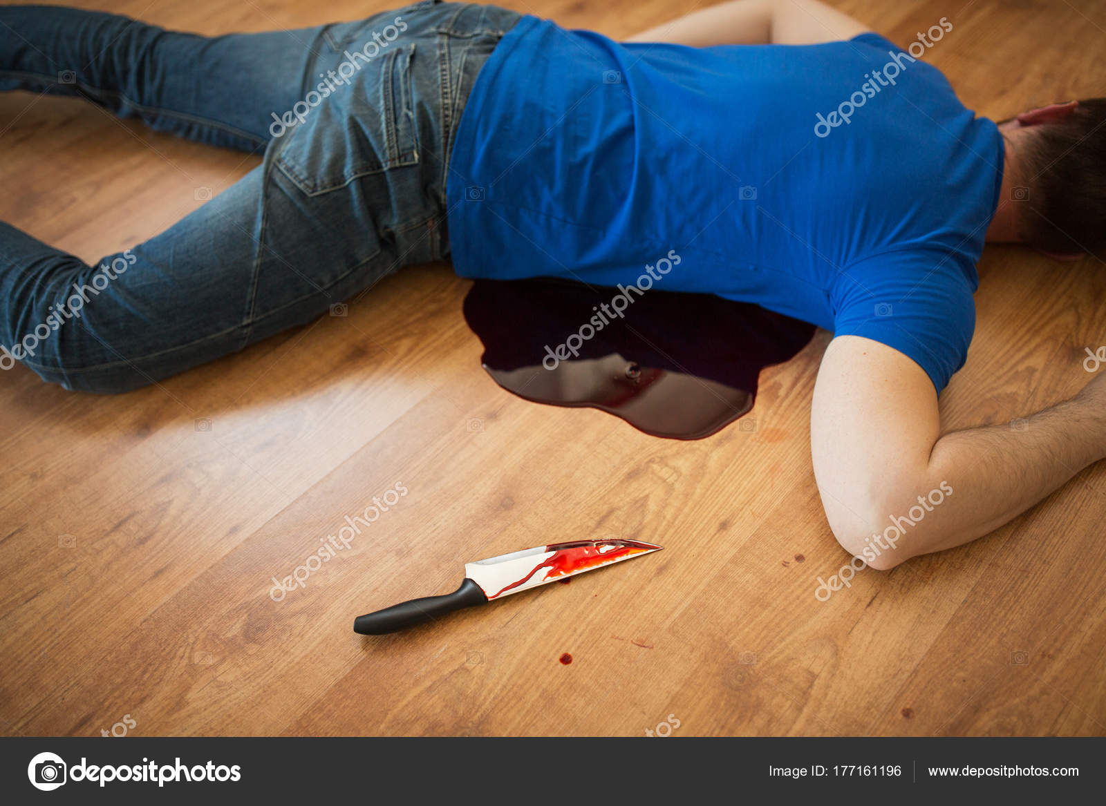 Dead Man Body Lying On Floor At Crime Scene Stock Photo