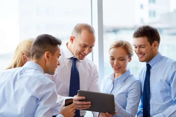 Business people with tablet pc computer at office — Stock Photo, Image