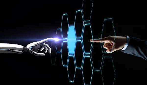 Robot and human hand touching network hologram — Stock Photo, Image