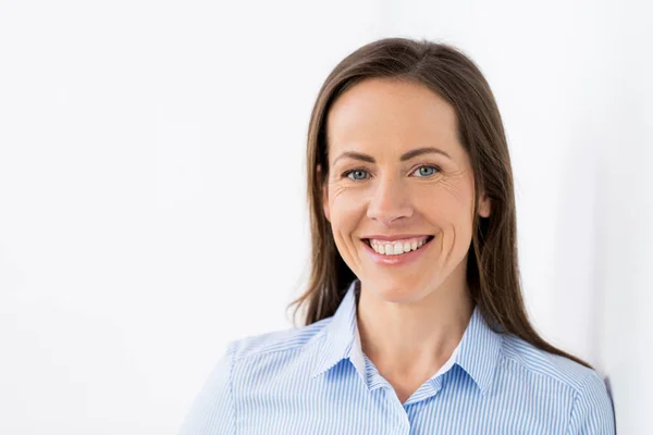 Face of happy smiling middle aged woman — Stock Photo, Image