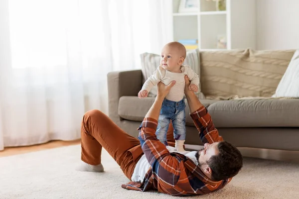 Happy father with little baby boy at home — Stock Photo, Image