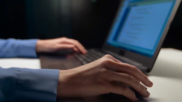 Businesswoman with laptop working at night office — Stock Video