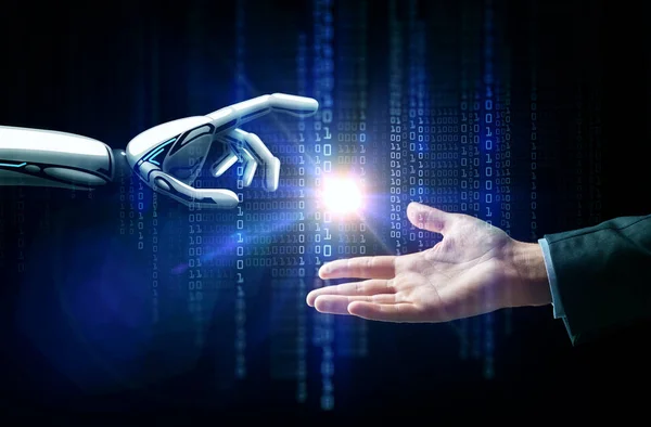 Robot and human hand flash light and binary code — Stock Photo, Image