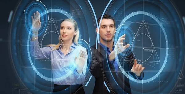 Business people using virtual screen projections — Stock Photo, Image