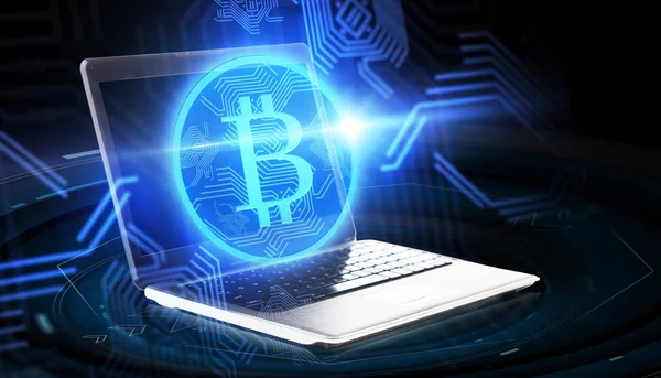 Laptop computer with bitcoin hologram — Stock Photo, Image