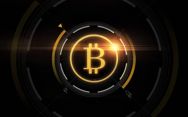 Gold-Bitcoin-Projektion über schwarzem Hintergrund — Stockfoto