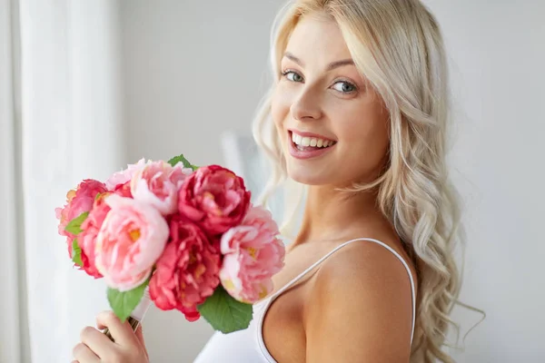 Close up of woman with bunch of flowers — Stock Photo, Image