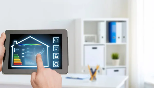 Tablet pc with smart home settings on screen — Stock Photo, Image