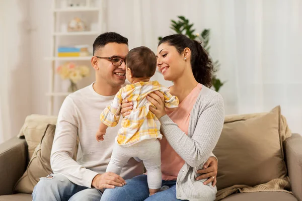 Happy family with baby daughter at home — Stock Photo, Image