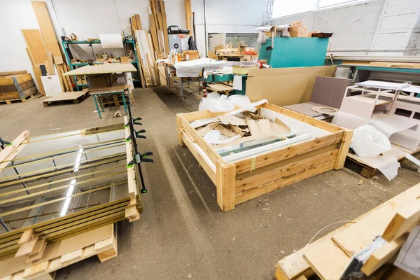 Container for industrial waste at factory workshop — Stock Photo, Image