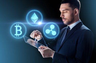 businessman with tablet pc and cryptocurrency clipart