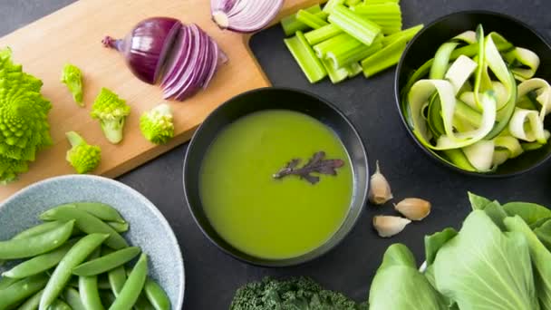 Close up of vegetable green cream soup in bowl — Stock Footage Close up of vegetable green cream soup in bowl Royalty Free Stock Footage