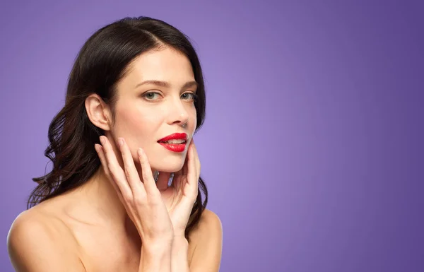 Beautiful young woman with red lipstick — Stock Photo, Image