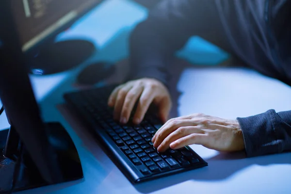 Hacker hands typing on computer keyboard — Stock Photo, Image