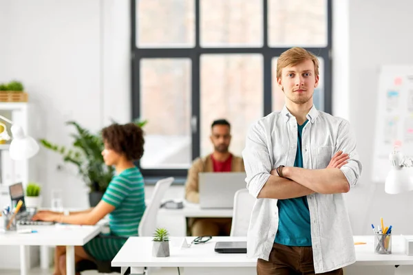 Man with cross hands at office — стоковое фото