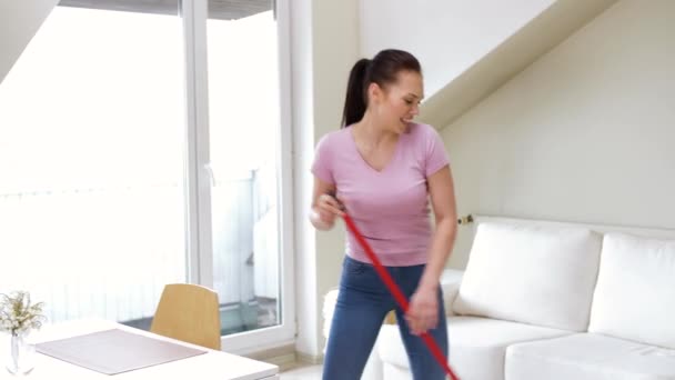 Woman or housewife with mop cleaning floor at home — Stock Video