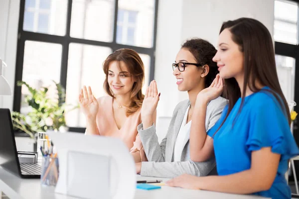 Businesswomen having video chat at office — Stock Photo, Image