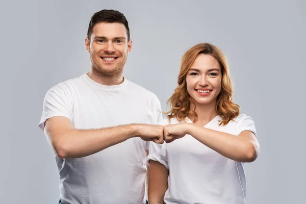 Portrait of happy couple in white t-shirts — Stock Photo, Image