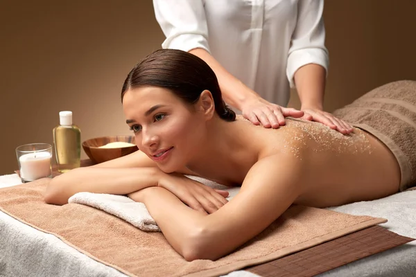 Close up of woman lying and having massage in spa — Stock Photo, Image