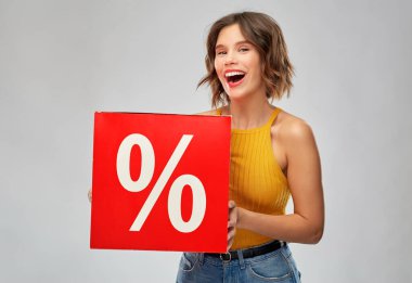 happy smiling young woman with sale signs clipart