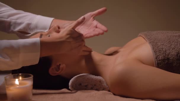 Woman having face and head massage at spa — Stock Video