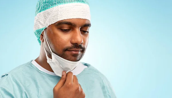 Face of sad doctor or surgeon with protective mask — Stock Photo, Image